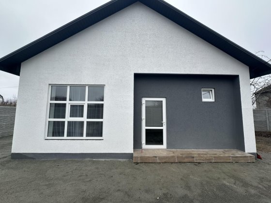 Продам современный дом в Подгородном из газобетона.