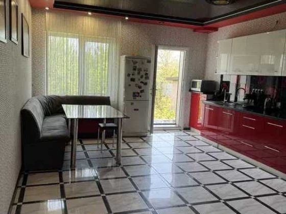 Продам дом с ремонтом на участке 10 соток в Подгороднем