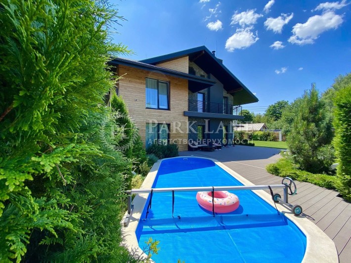 Конча-Заспа. Современный дом с бассейном. 14 соток земли. - фото 1