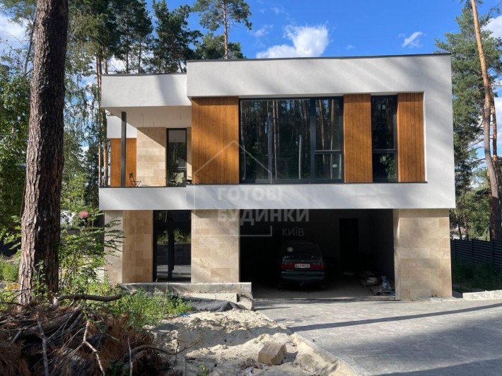 Крутезний будинок в стилі Hi-Tech, з топовим розташуванням у лісі - фото 1