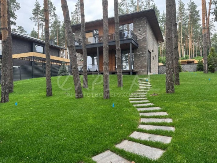 Продаж будинку хай-тек в с.Ходосівка 287 м2 10 соток КМ у лісі. - фото 1