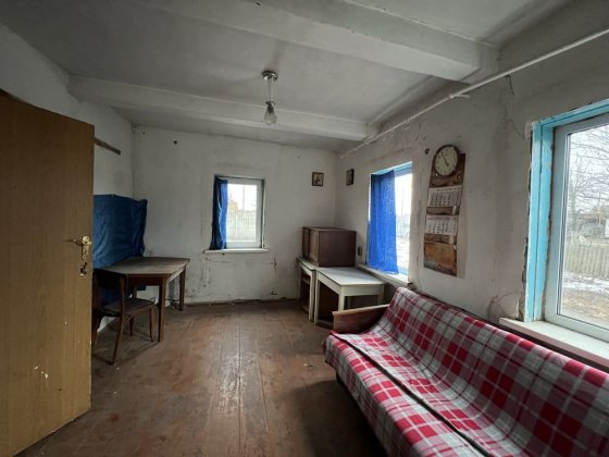 Продам будинок з земельною ділянкою на жилій вулиці міста Узина Узин