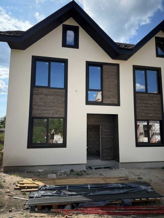 Таунхаус у Бучі, вул. Сергія Мазіна — 82 м² + мансарда 35 м², 67 900 $ - фото 1