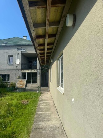 Житловий будинок та земельна ділянка 10 сот., м. Жовква - фото 1