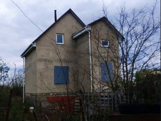 У продажу ділянка  12.  соток з капітальною коробкою Великодолинське