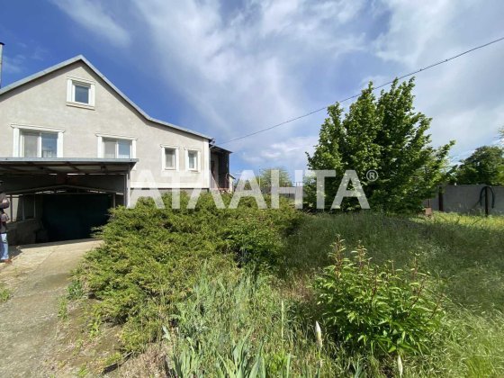 Дом на высоком цоколе в с.Великий Дальник-гараж, погреб,15соток земли. Великий Дальник