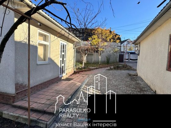 Продам будиночок поряд з ставочком Дунаївці