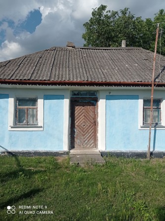 Продам будинок  та 23 сотки землі  в с.Довжок - фото 1