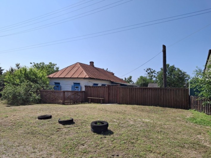 Продам земельну ділянку із житловою спорудою - фото 1