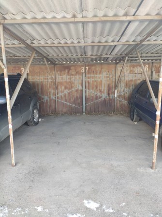 Продам крытое место на стоянке Заболотного 28-Б - фото 1