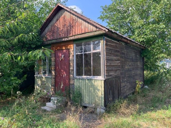 Деревʼяний будинок, як раніше було на базах відпочинку Київ