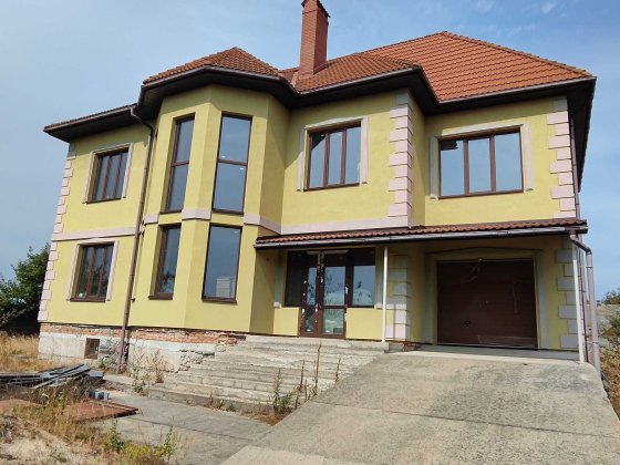 Продається новий двоповерховий цегляний будинок на березі річки. Житомир