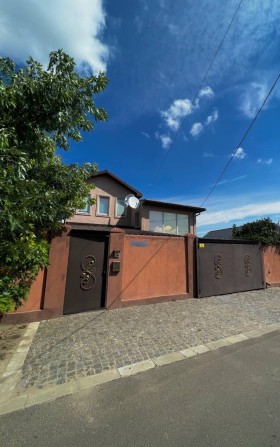 2х эт.дом, центр Варваровки-95000$ - фото 1