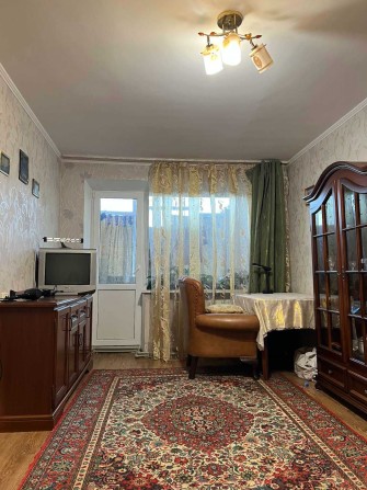 Трикімнатна квартира з мінімальним оформленням - фото 1