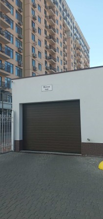 Сдам  паркоместо в 35 жемчужине. - фото 1