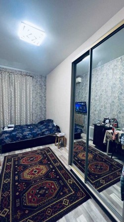 Комната в коммуне в историческом центре города, ул. Ольгиевская - фото 1