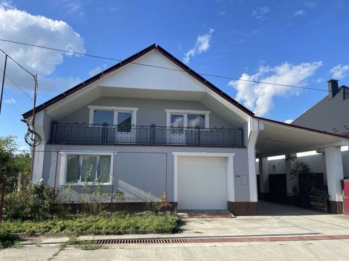 Будинок з прибудовою та сонячною електростанцією 30 кВт - фото 1