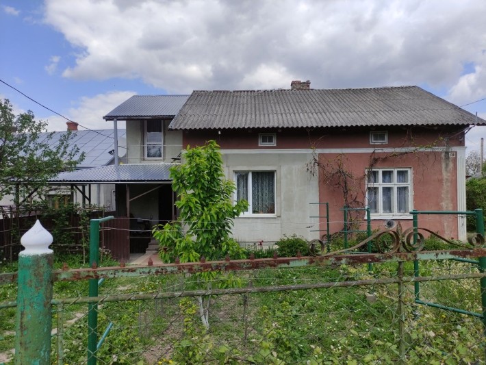 Продаю половину Будинку,цегл гараж та прибуд зем ділянку пл 0.0412Га - фото 1