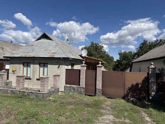 Будиночок біля річки Бершадь