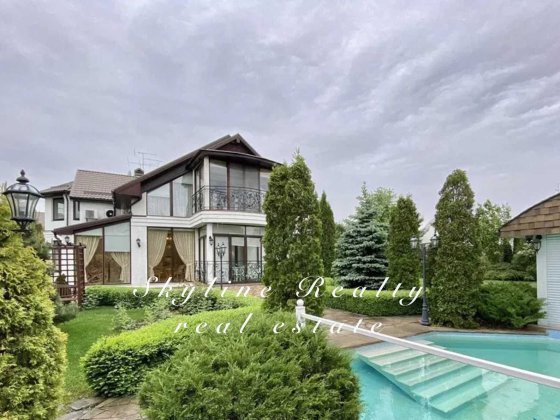 Ексклюзивний особняк  в КМ Дніпрова Хвиля з виходом на річку Козин