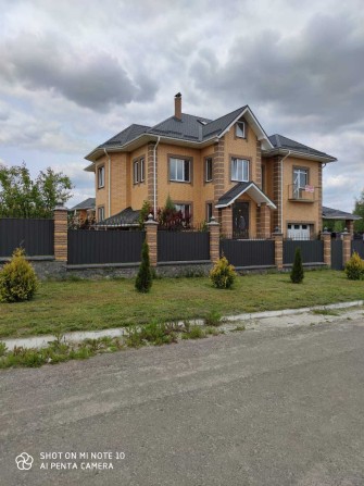 Продаж будинку з ділянкою на 24 сотки, 475 кв. м, 6 кімнат - фото 1