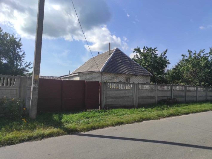 Будинок та земельна ділянка - фото 1