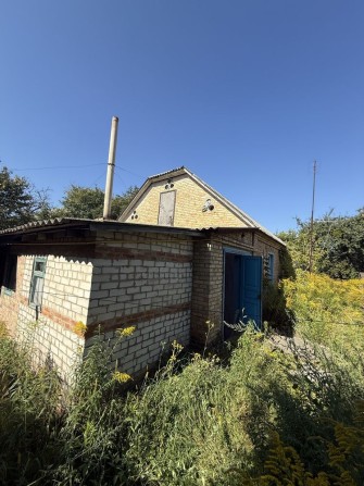 Продаж половини будинку з ділянкою 6 соток в с.Микуличі - фото 1