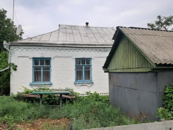 Продам  будинок з пічним та газовим опаленням. Тальное