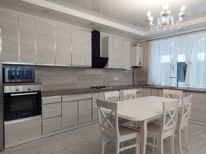 Дуплекс з ремонтом та просторою ділянкою! 4 кімнати. - фото 1