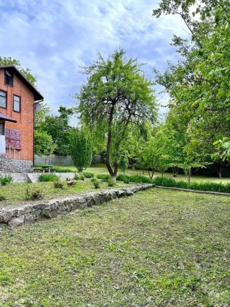 Продаж земельної ділянки 11 сот з гаражем - фото 1