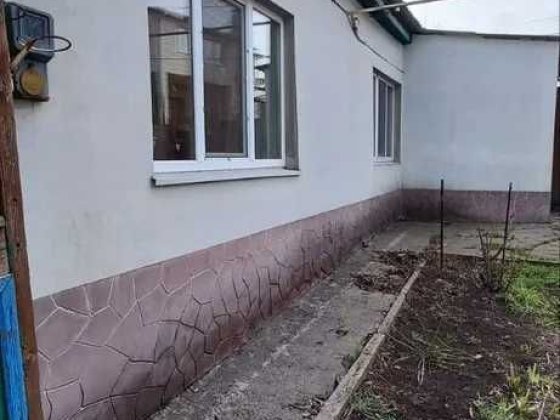 Продам дом с участком земли 7 сот в центральной части Днепра Дніпро