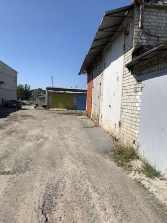 Продам 2 суміжних гаража на Олексіївці довжиною 12 м та висотою 5 м. - фото 1