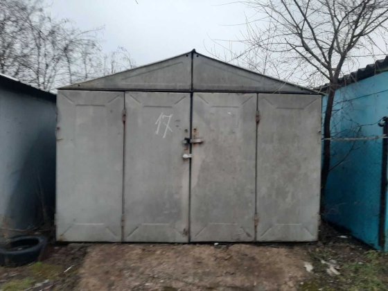 Железный гараж на левом берегу, Каменское Курилівка