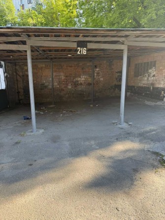 Продам крите паркувальне місце в гаражному кооперативі паркомісце - фото 1