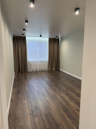 Квартира з ремонтом 77 м² . 1268 $ - м² - фото 1