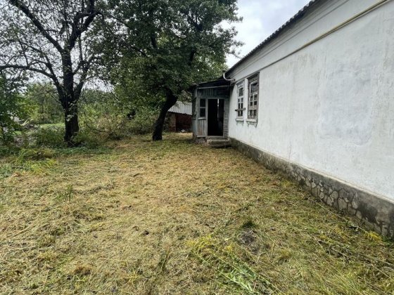 Продаж 93/300 частини житлового будинку по вул. Романенка в м. Малині Малин