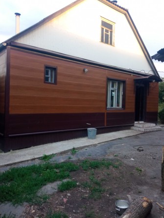 Добротное домовладение в центре Люботина - фото 1