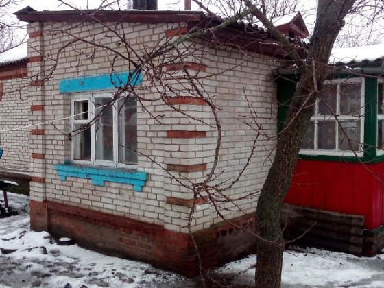 Продається пів будинку р-н "Новолозовка" Ромны