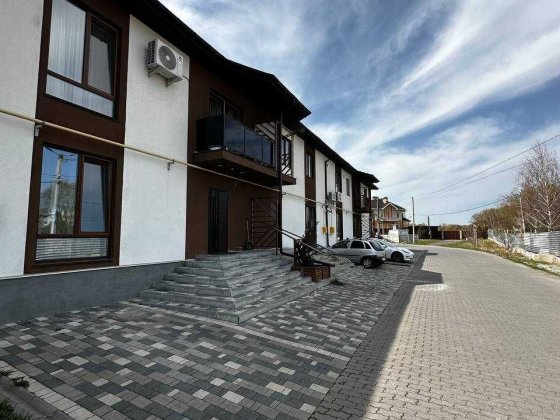 Зданий котедж 120 м² в Отрадному, закритий масив, кухня-вітальня 50 м² Хмельницький