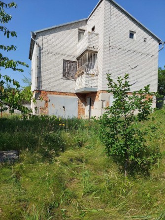 Продам дом с участком в г. Подгородное - фото 1