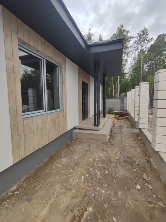 Одноповерховий будинок з просторою ділянкою - фото 1