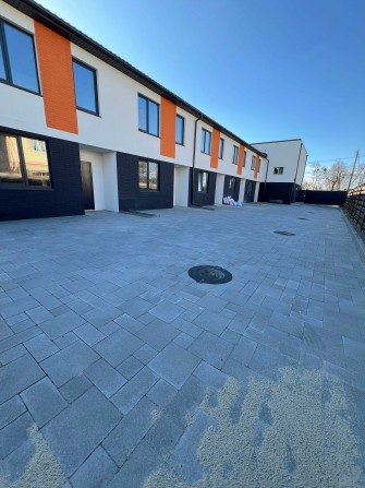 Таунхаус у Ворзелі — 105 м², 4 окремі кімнати, готовий до оздоблення - фото 1