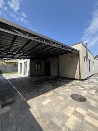 Одноповерховий будинок з стильним дизайнерським ремонтом - фото 1