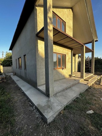 Добротный дом в пгт Таирово - фото 1