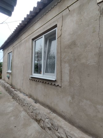 Продам дом по центральной улице. - фото 1