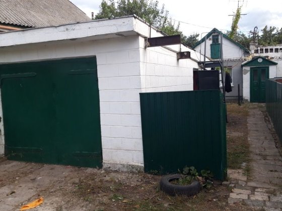 Продам дом, гараж, летняя кухня под  Ремонт. Дніпро