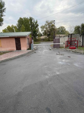 Сдам место на площадке в Днепре-стоянка грузовиков и техники - фото 1