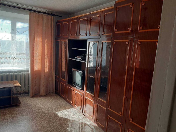 Кімната для молодої працюючої дівчини без шкідливих звичок - фото 1