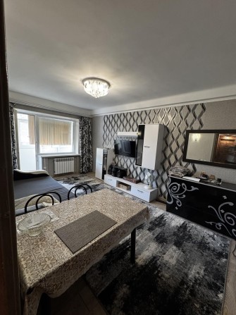 Продам 4 ком.квартиру. Правый берег. Центр. Площадь  66м2. 4 этаж. - фото 1