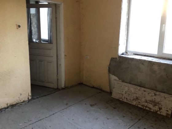 Приватизована квартира на землі